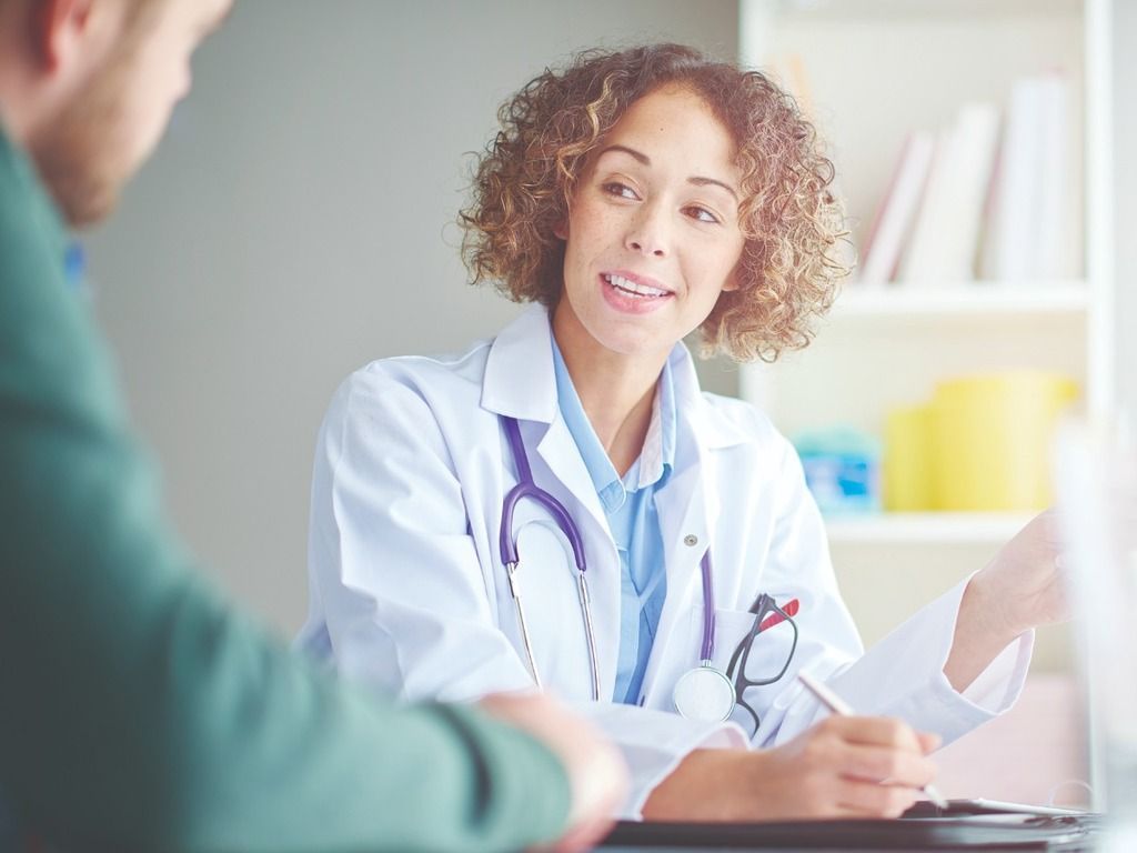 doctor asking questions to a patient