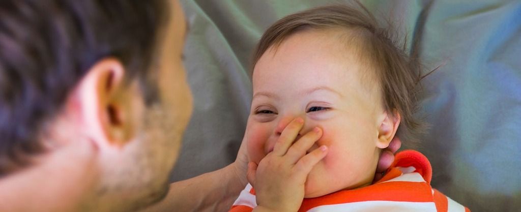 Father and Infant with down sydrome