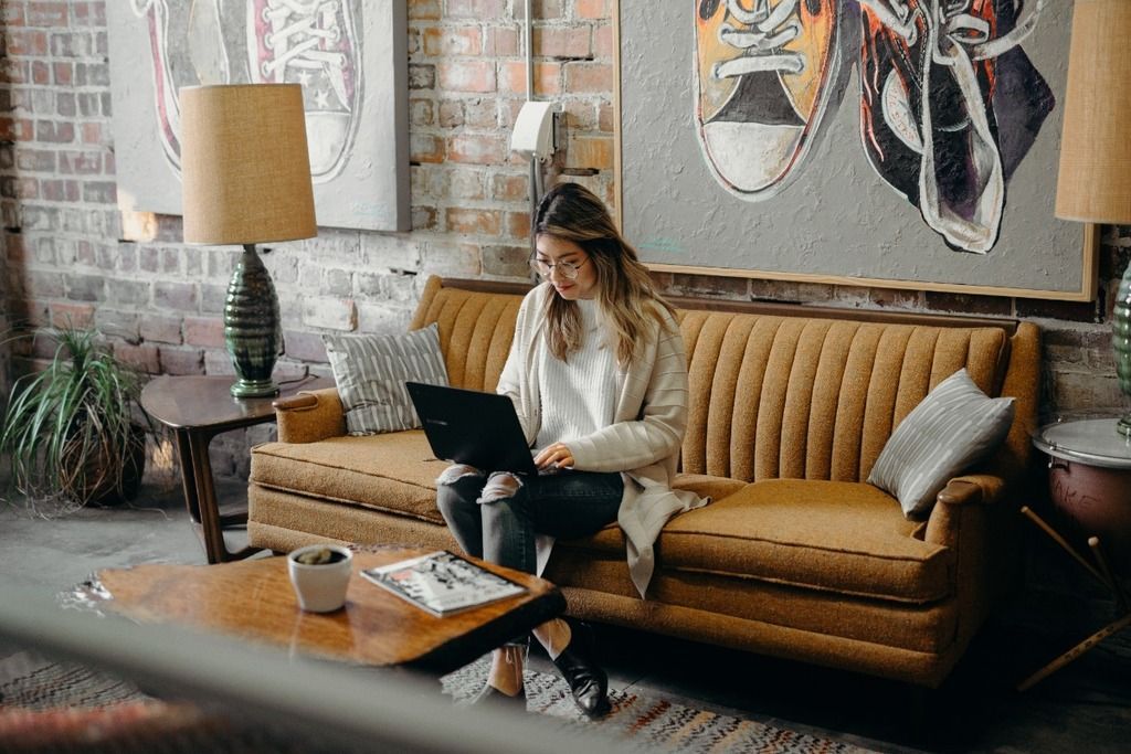 Woman looking at laptop for facereader online