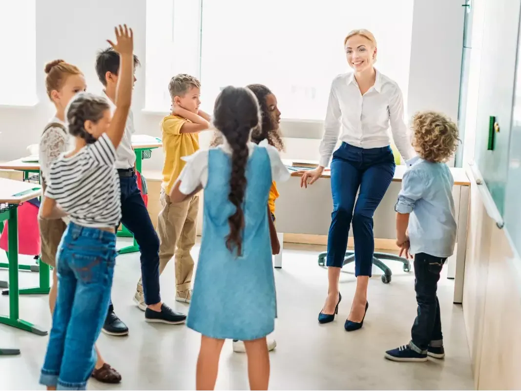 kids and teacher in classroom