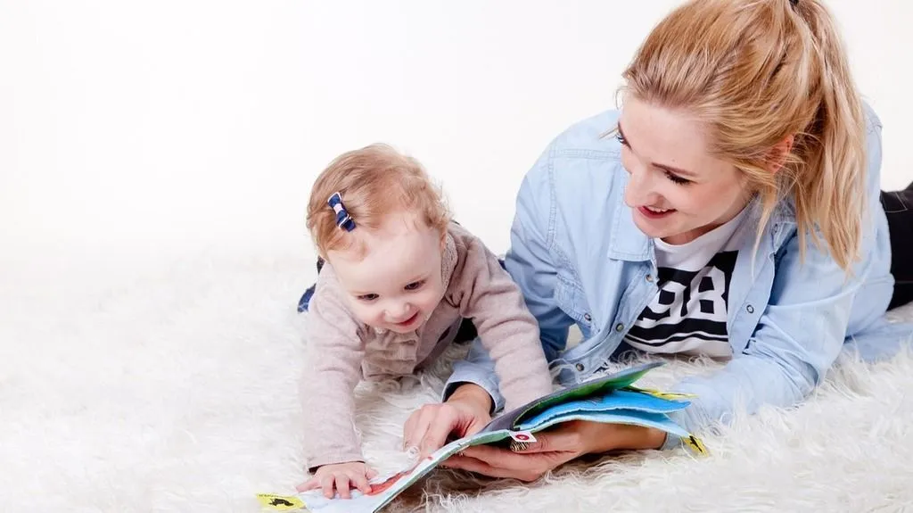 mother-and-child-reading-white-carpet