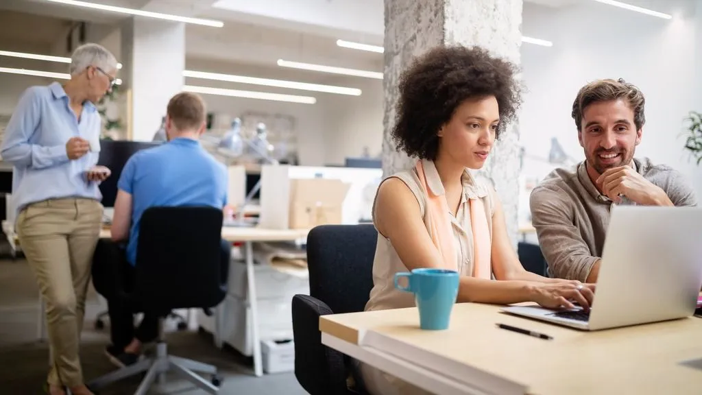 People working in an office setting with FaceReader